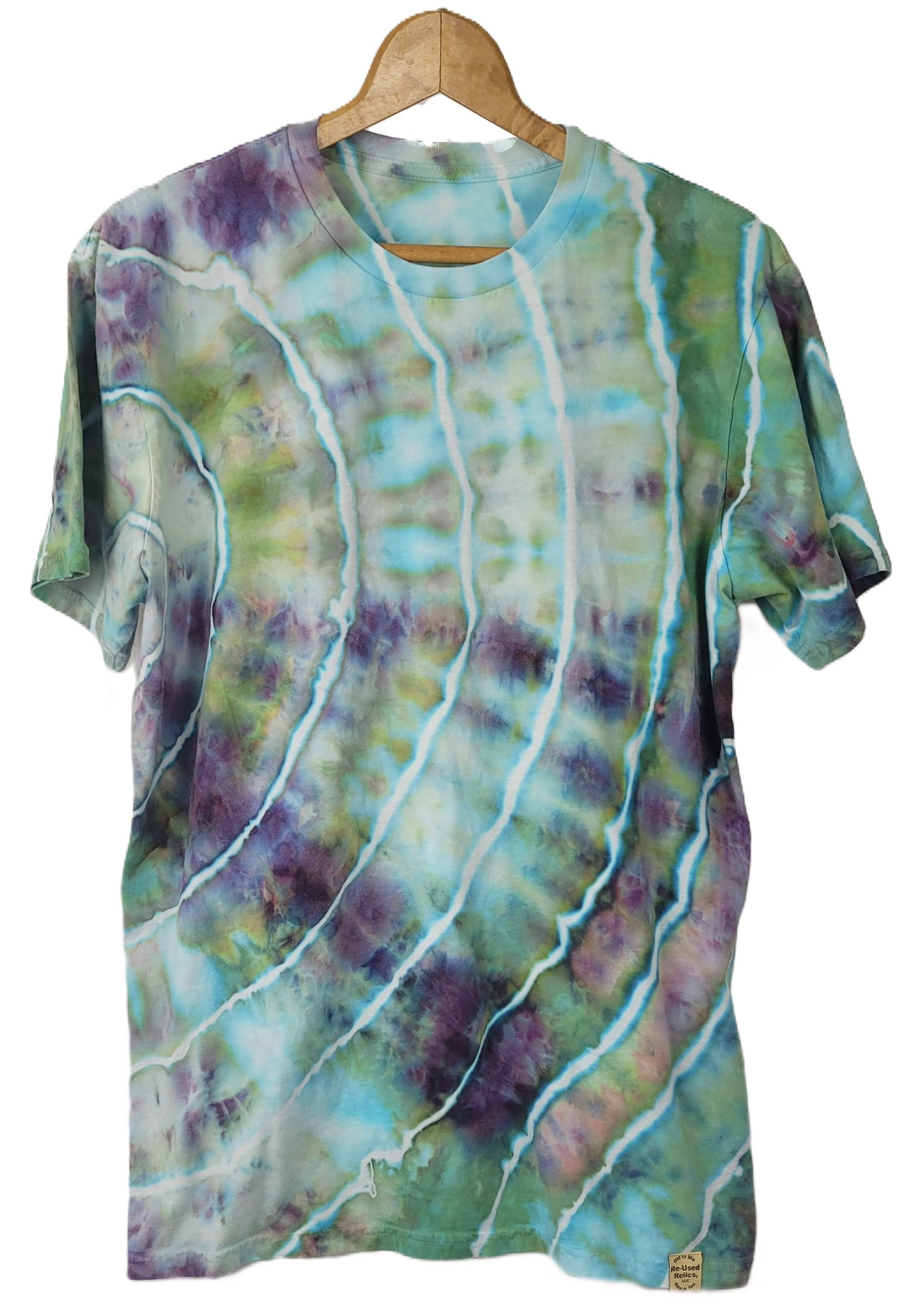 Colorful tie-dye shirt on a wooden hanger against a white background