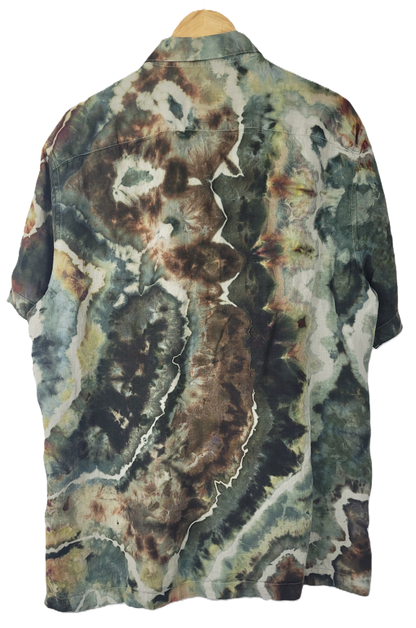 Short-sleeve shirt with a tie-dye pattern on a white background
