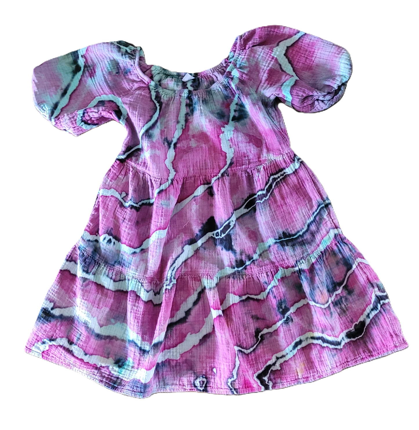 Pink dress with abstract pattern on a white background