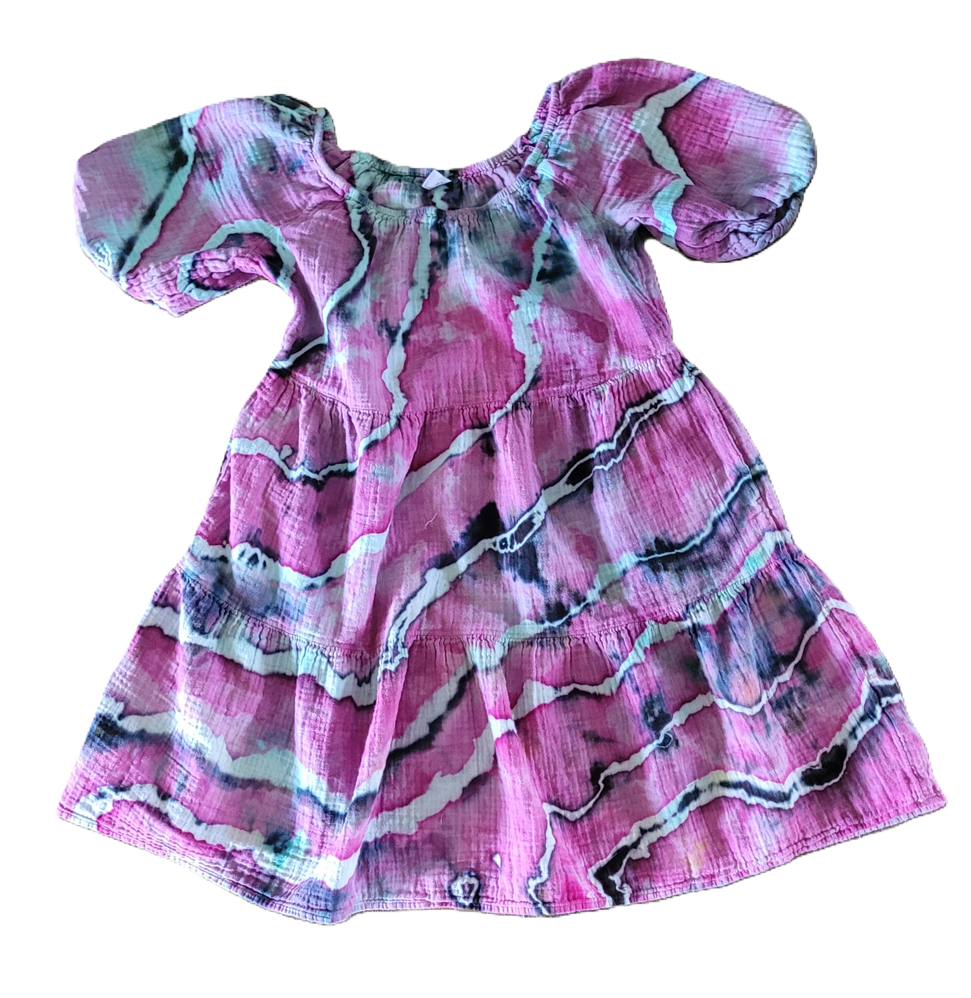 Pink dress with abstract pattern on a white background