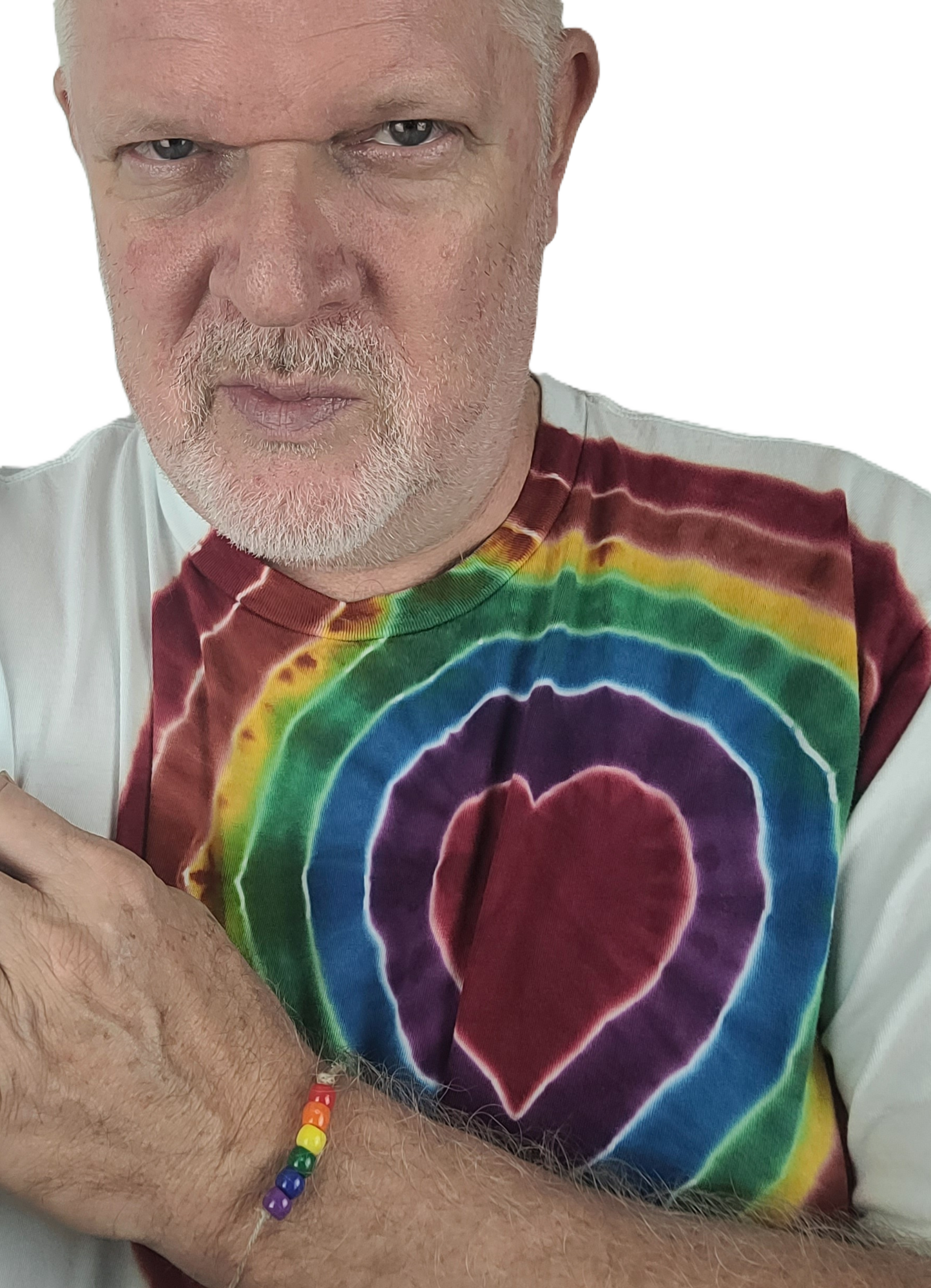 Man wearing a tie-dye shirt with a heart design on a white background