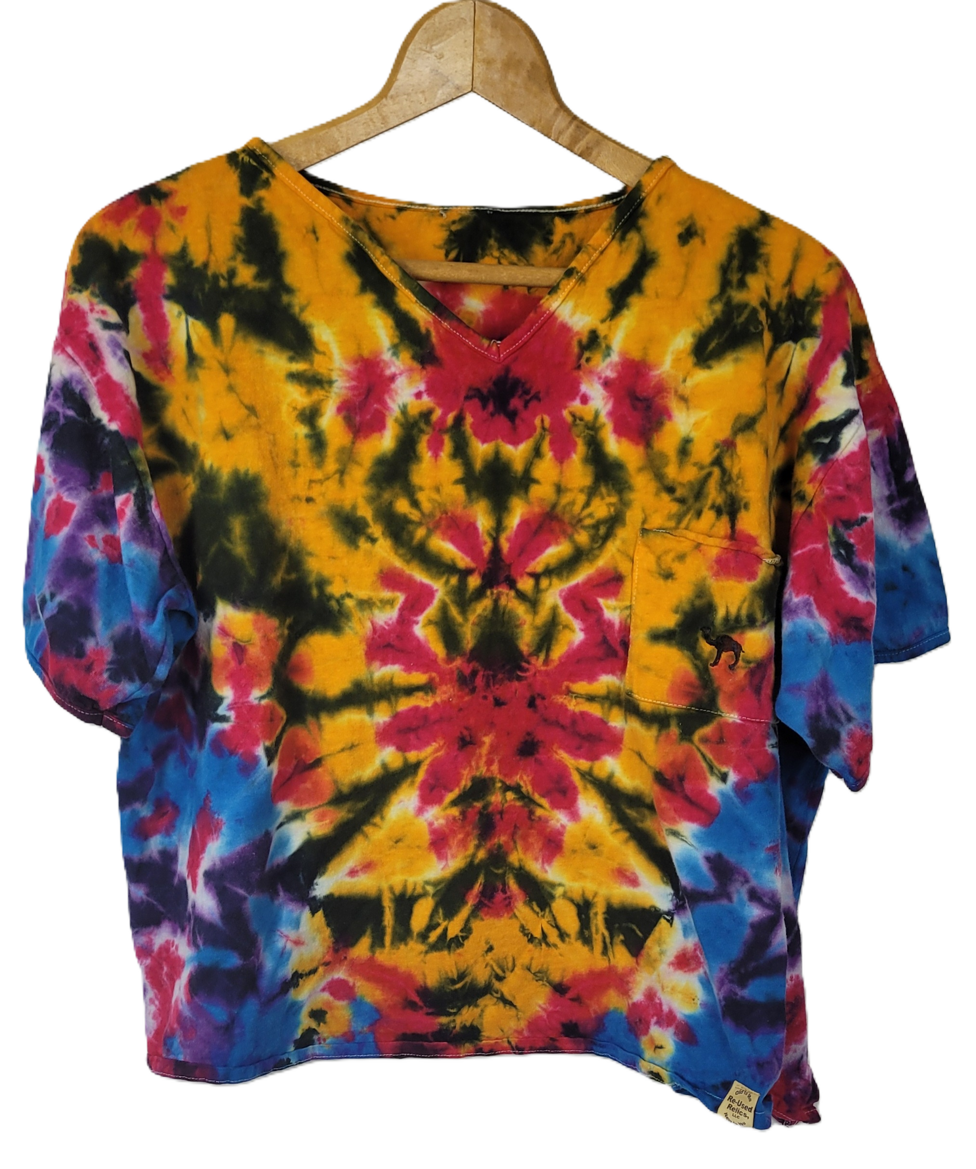 Colorful tie-dye shirt on a wooden hanger against a white background