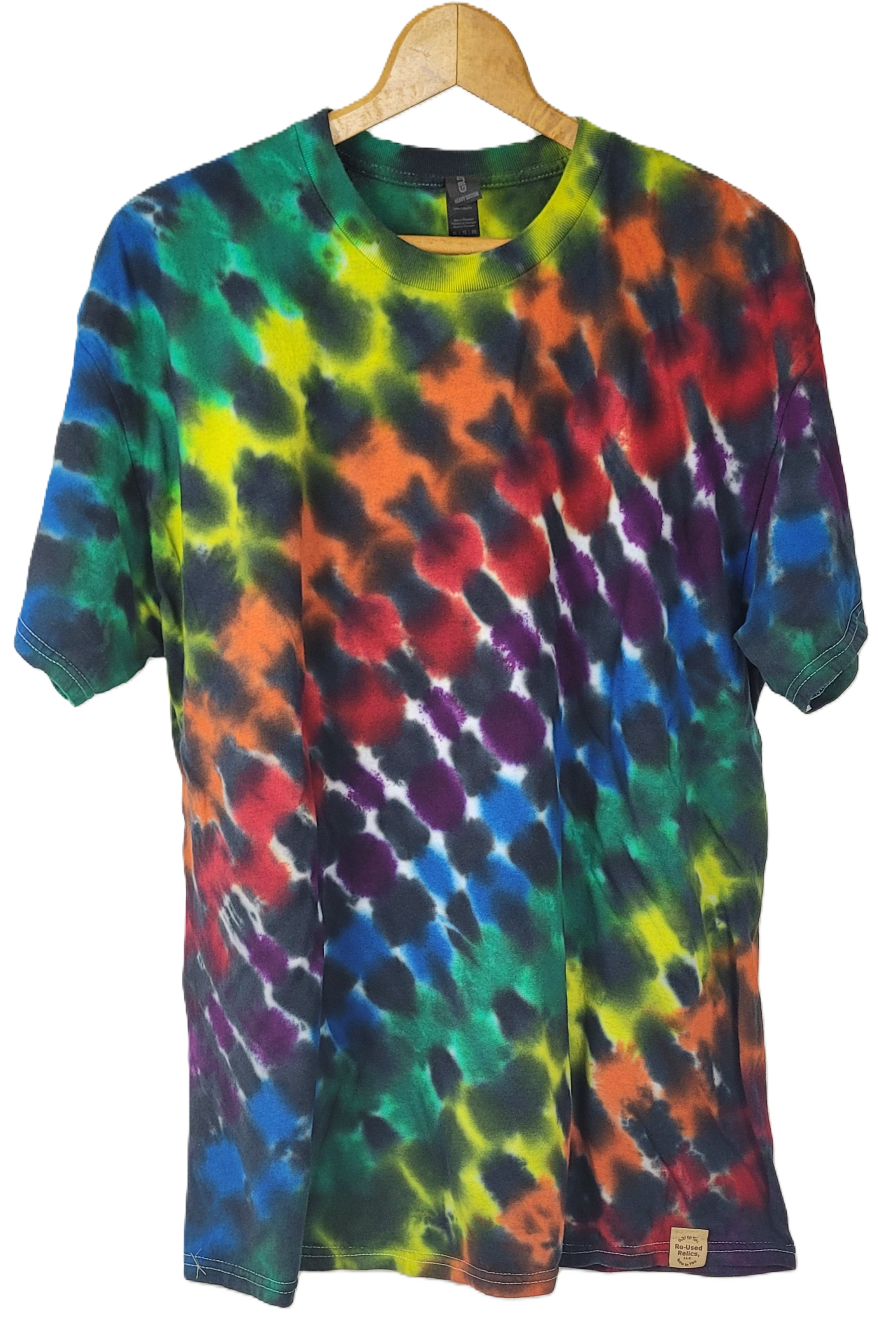 Multicolored tie-dye t-shirt on a hanger against a white background