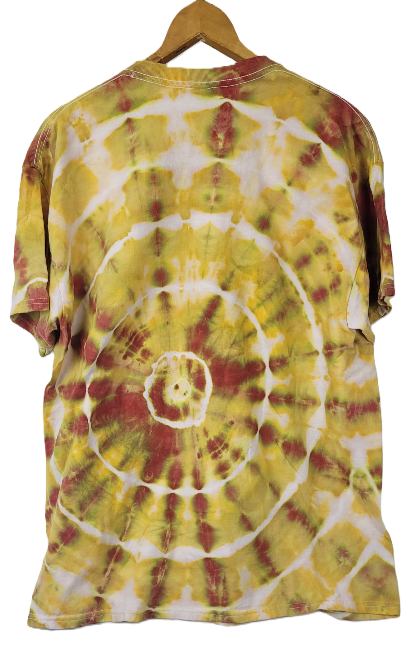 Tie-dye t-shirt with a spiral pattern in yellow, red, and white on a hanger.