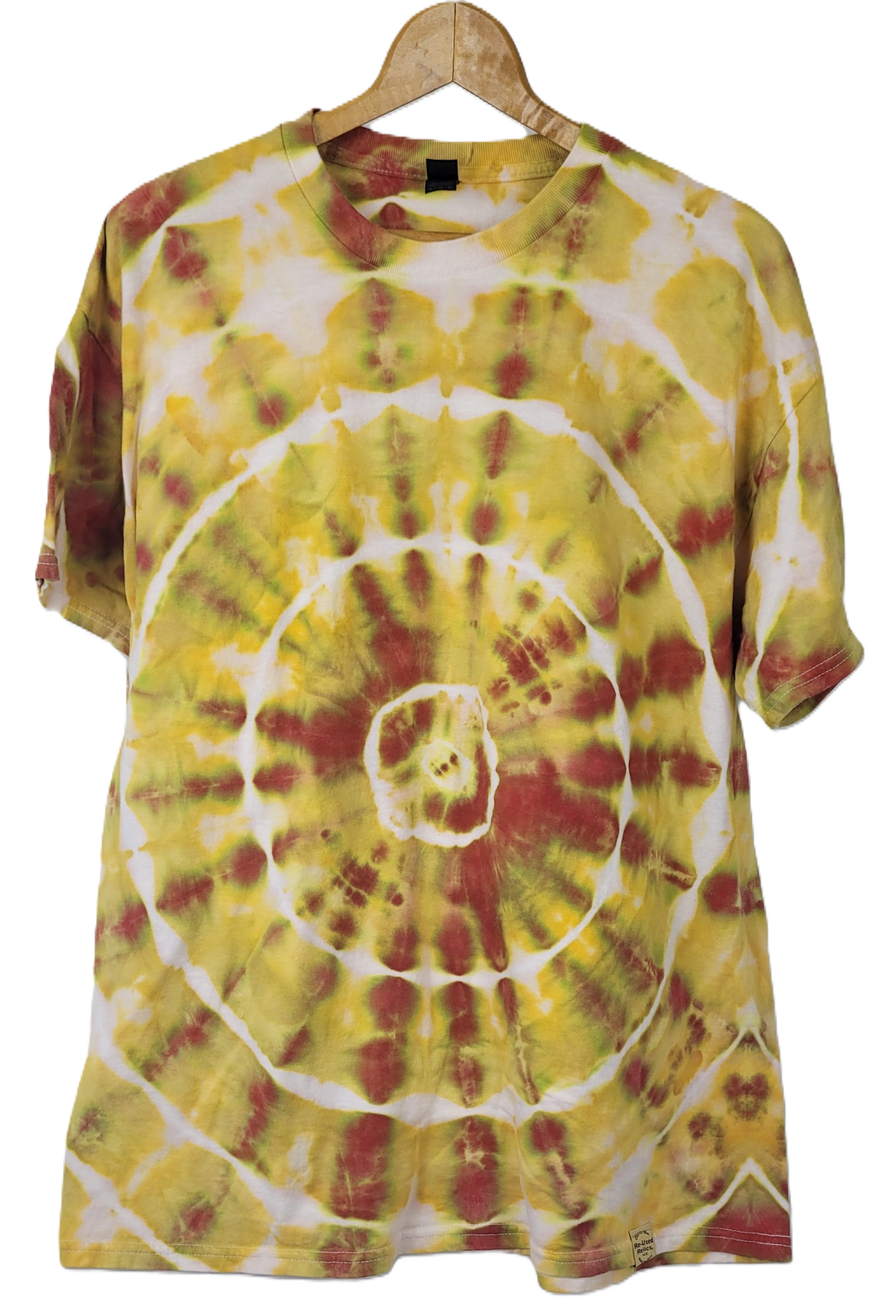 Tie-dye t-shirt with yellow and red spiral pattern on a hanger against a white background
