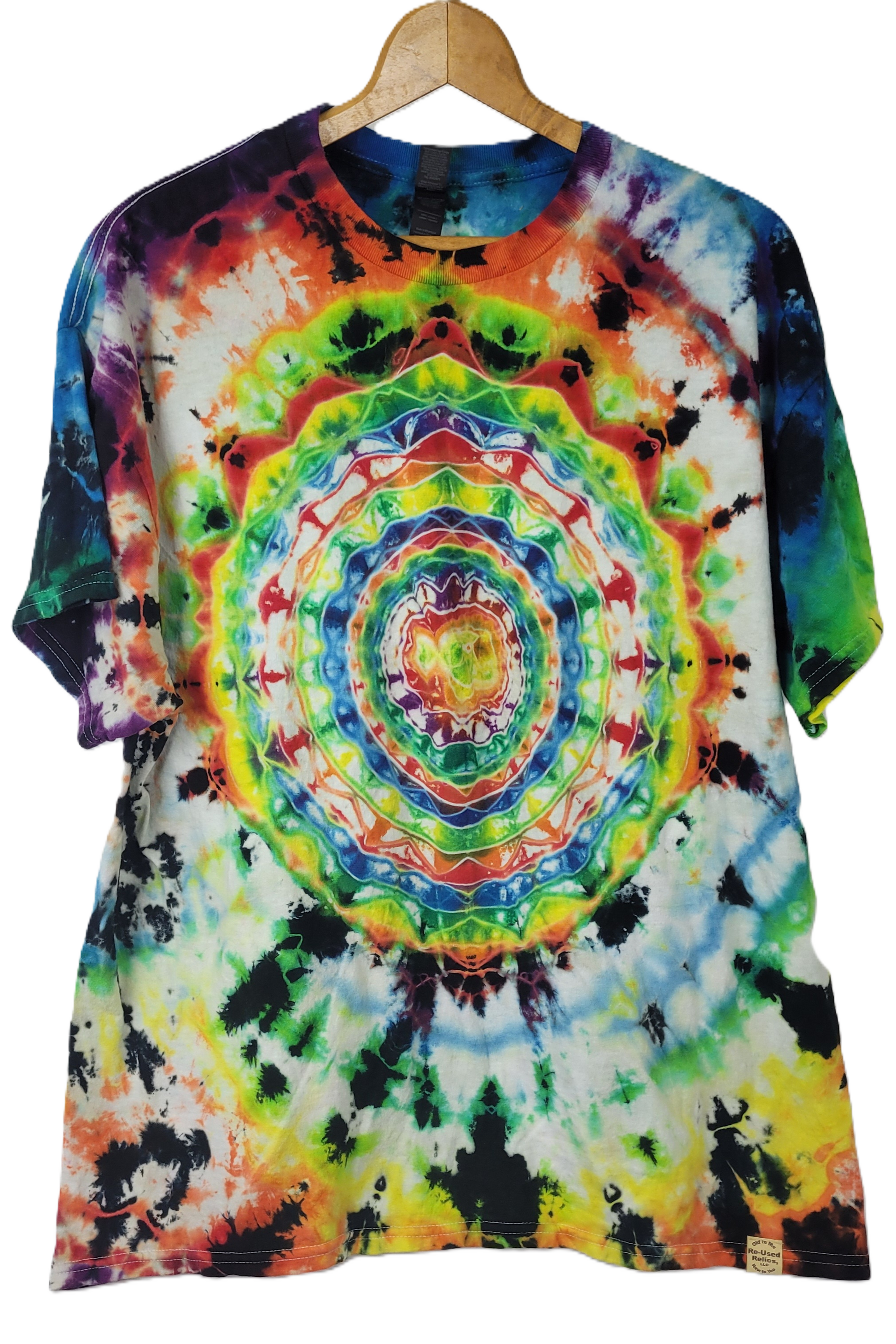 Colorful tie-dye t-shirt on a wooden hanger with a plain background