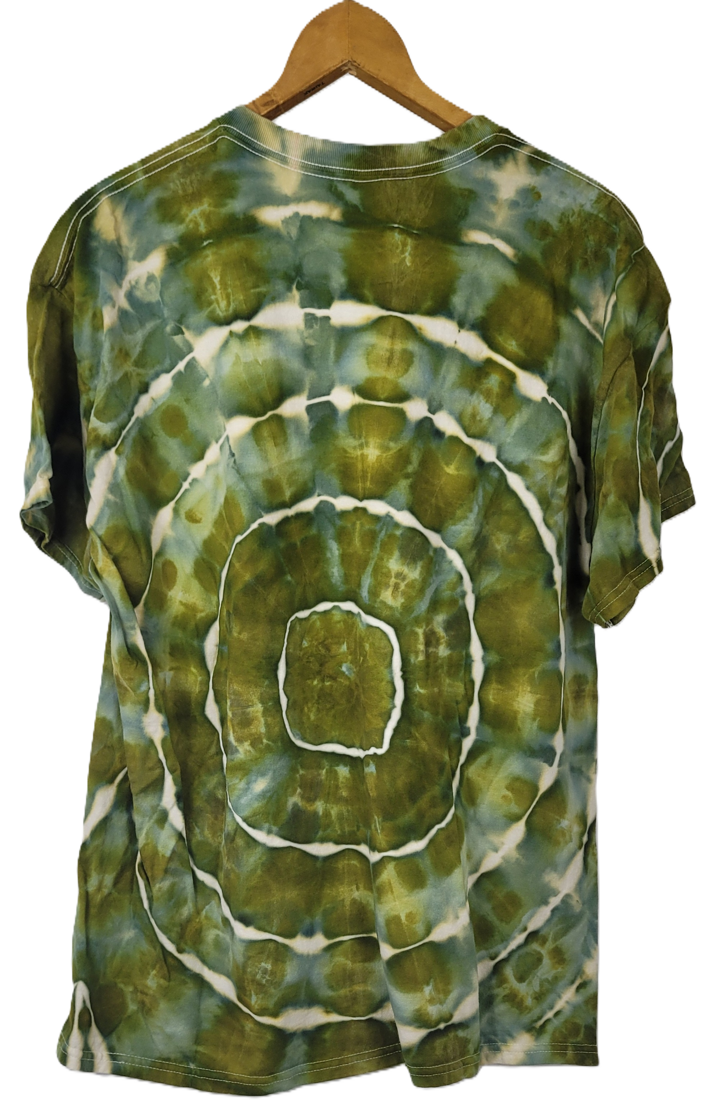 Tie-dye t-shirt with green and white spiral pattern on a hanger