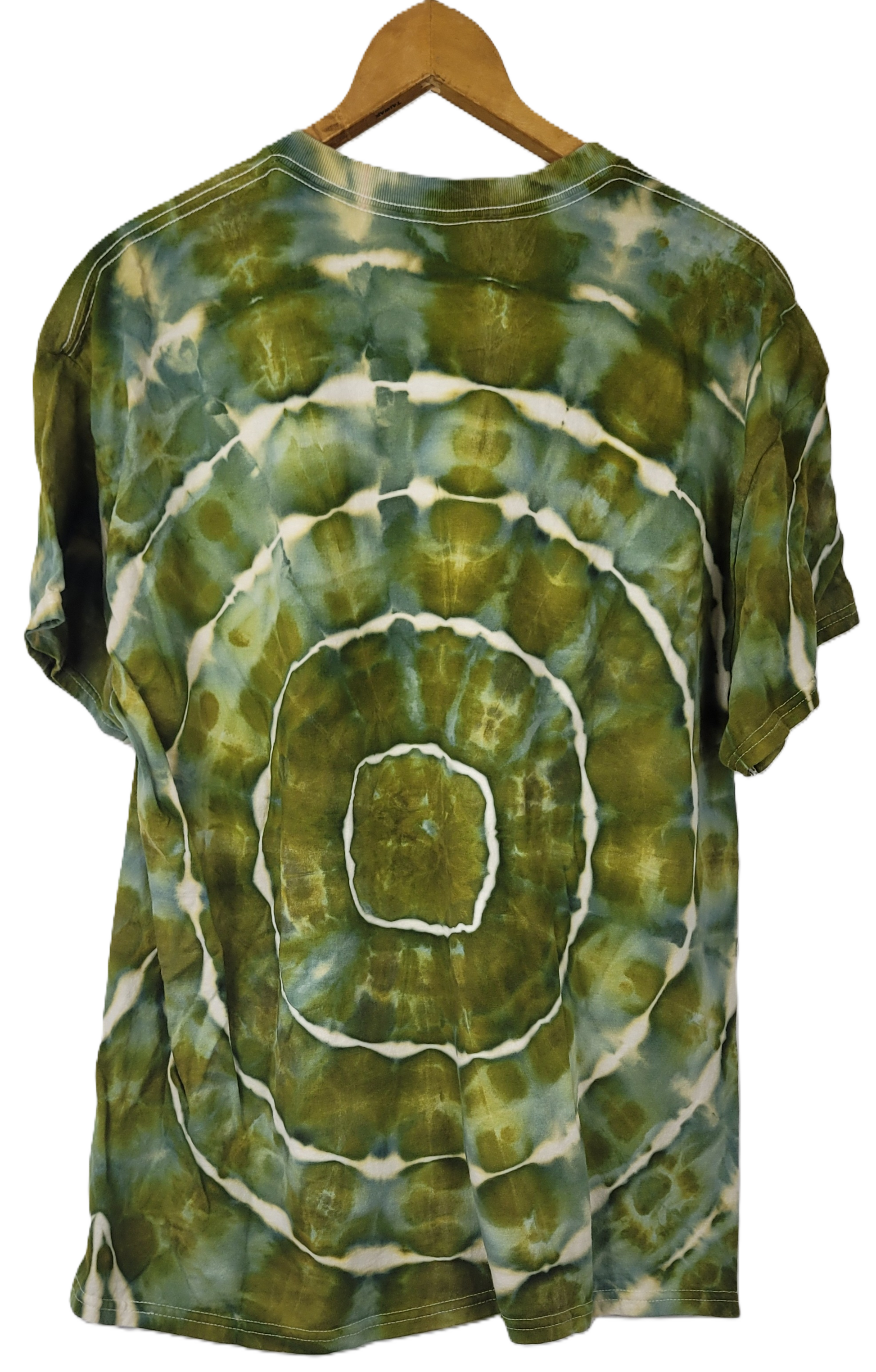 Tie-dye t-shirt with green and white spiral pattern on a hanger