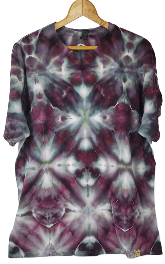 Tie-dye shirt on a hanger with a white background