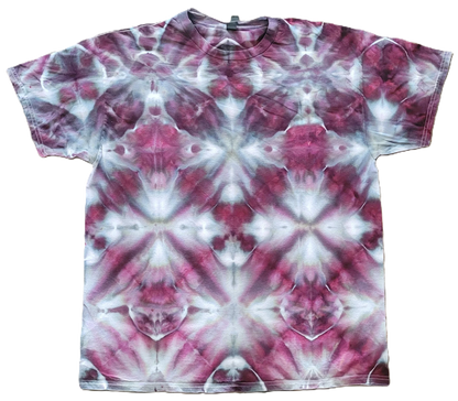 Tie-dye t-shirt with a pink and white pattern on a white background