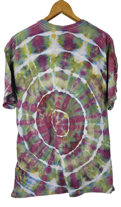 Tie-dye t-shirt with a spiral pattern on a hanger