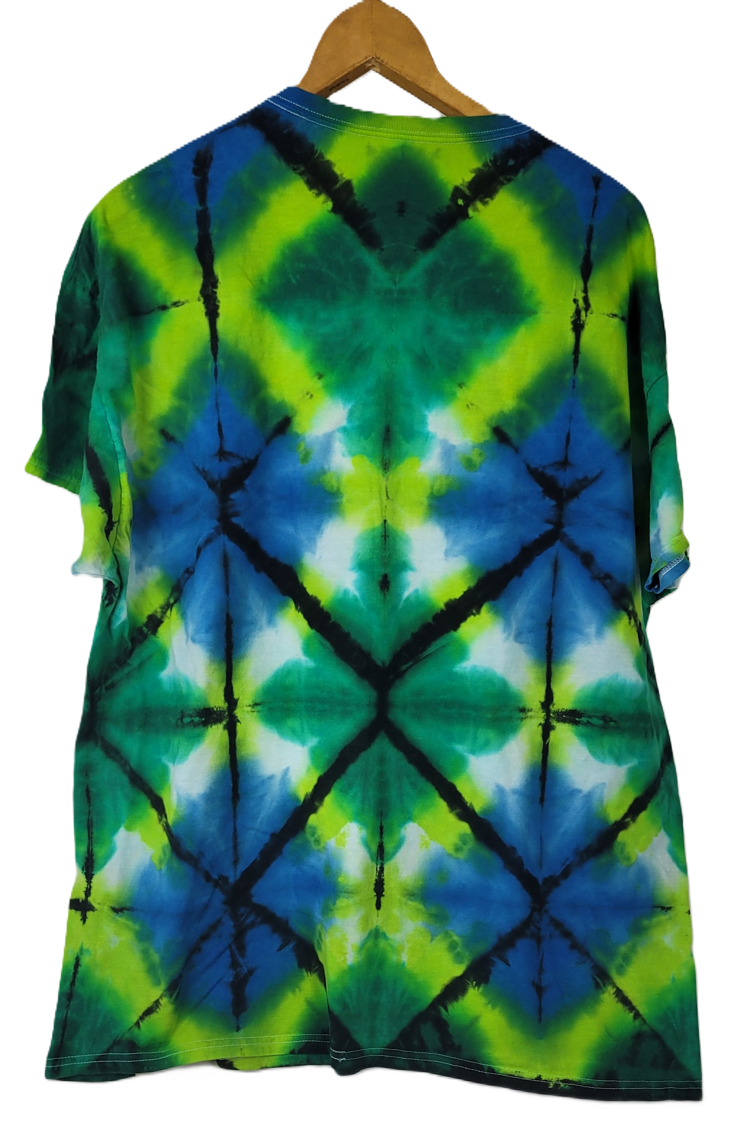 Tie-dye t-shirt with green, blue, and black pattern on a white background