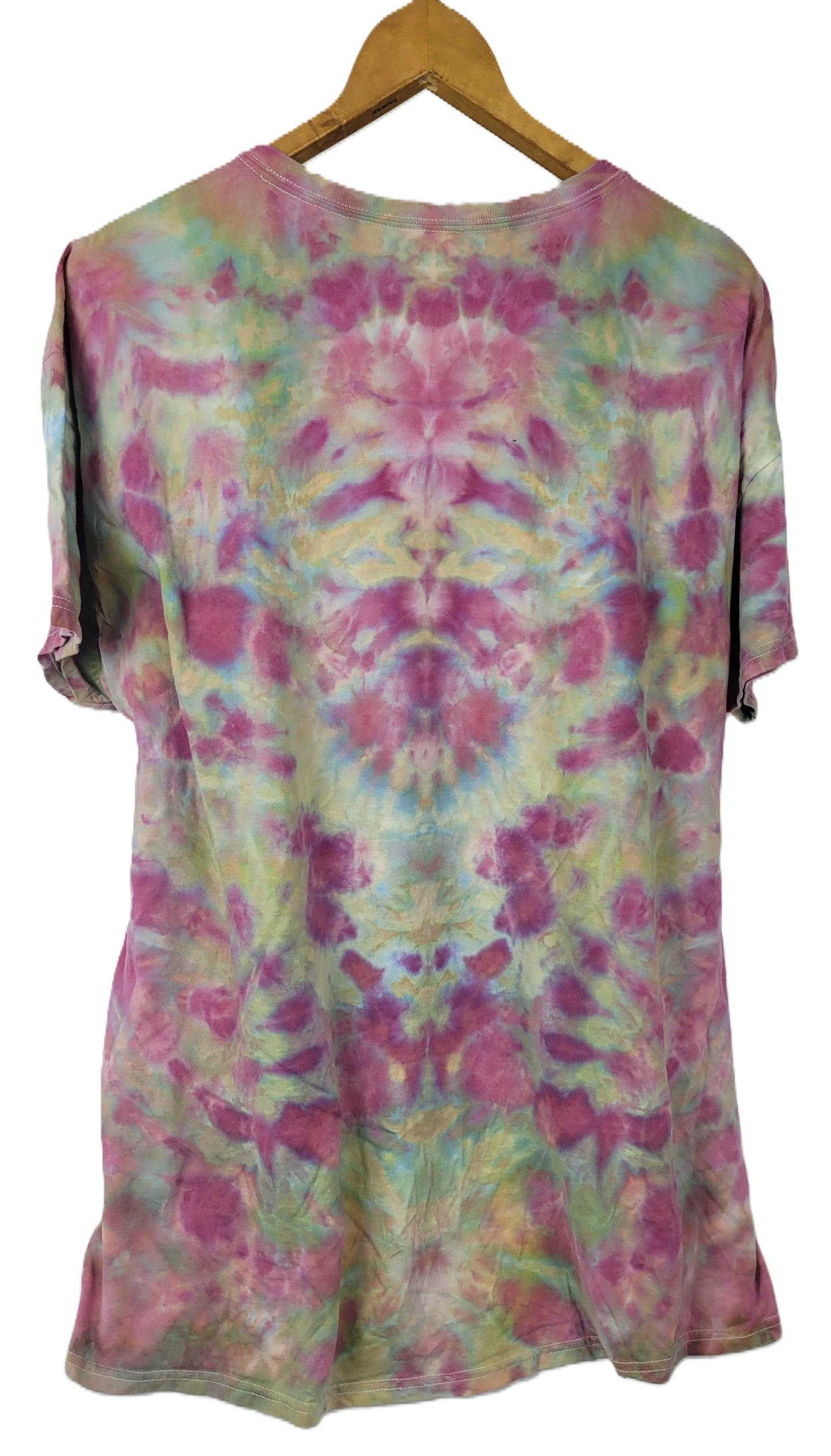 Tie-dye dress on a hanger with a white background