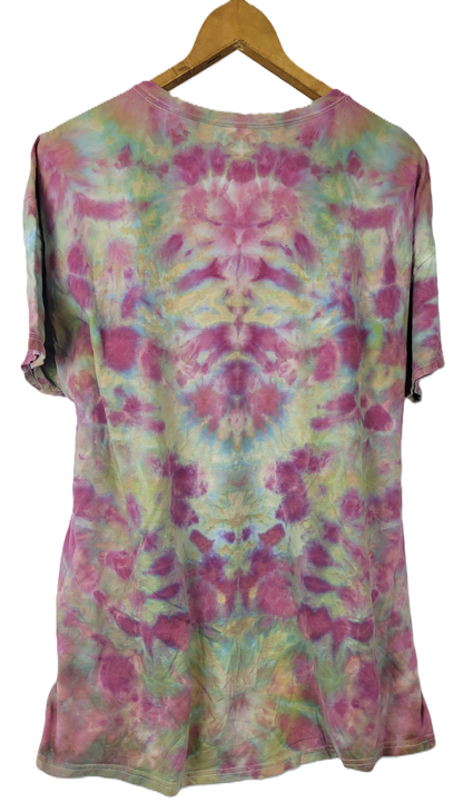 Tie-dye dress on a hanger with a white background