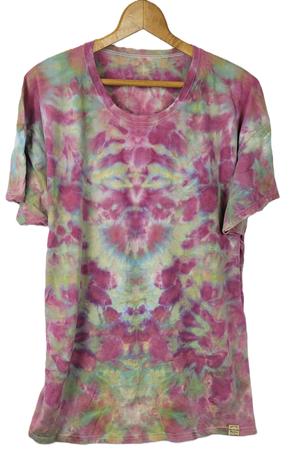 Tie-dye t-shirt on a hanger with a white background