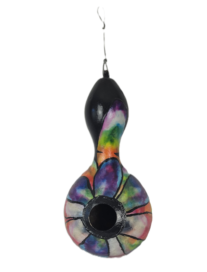 Colorful birdhouse with a black hook on a white background