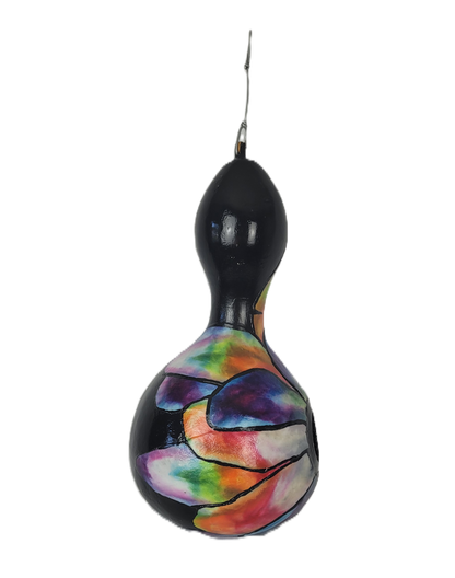 Black gourd birdhouse with colorful design on a white background