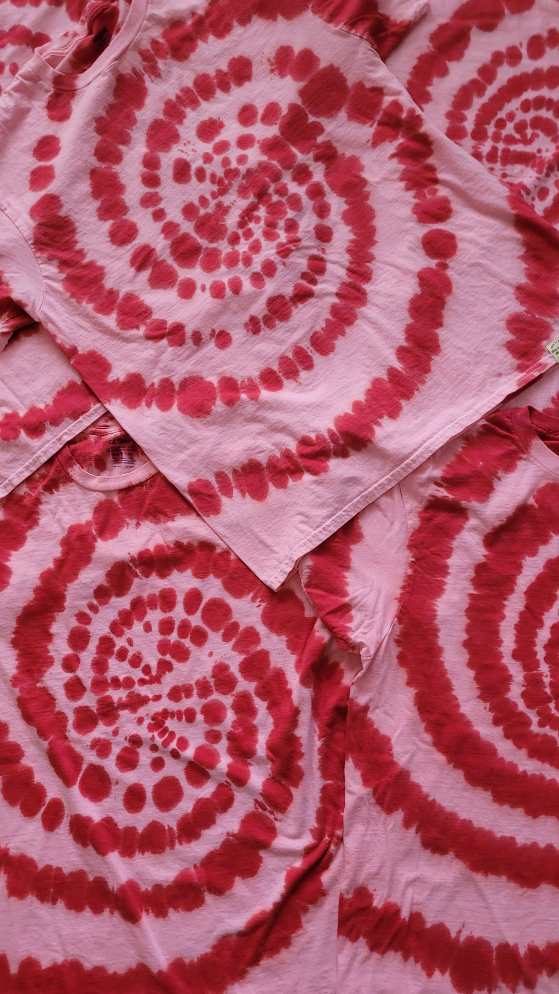 Red and white spiral pattern on fabric