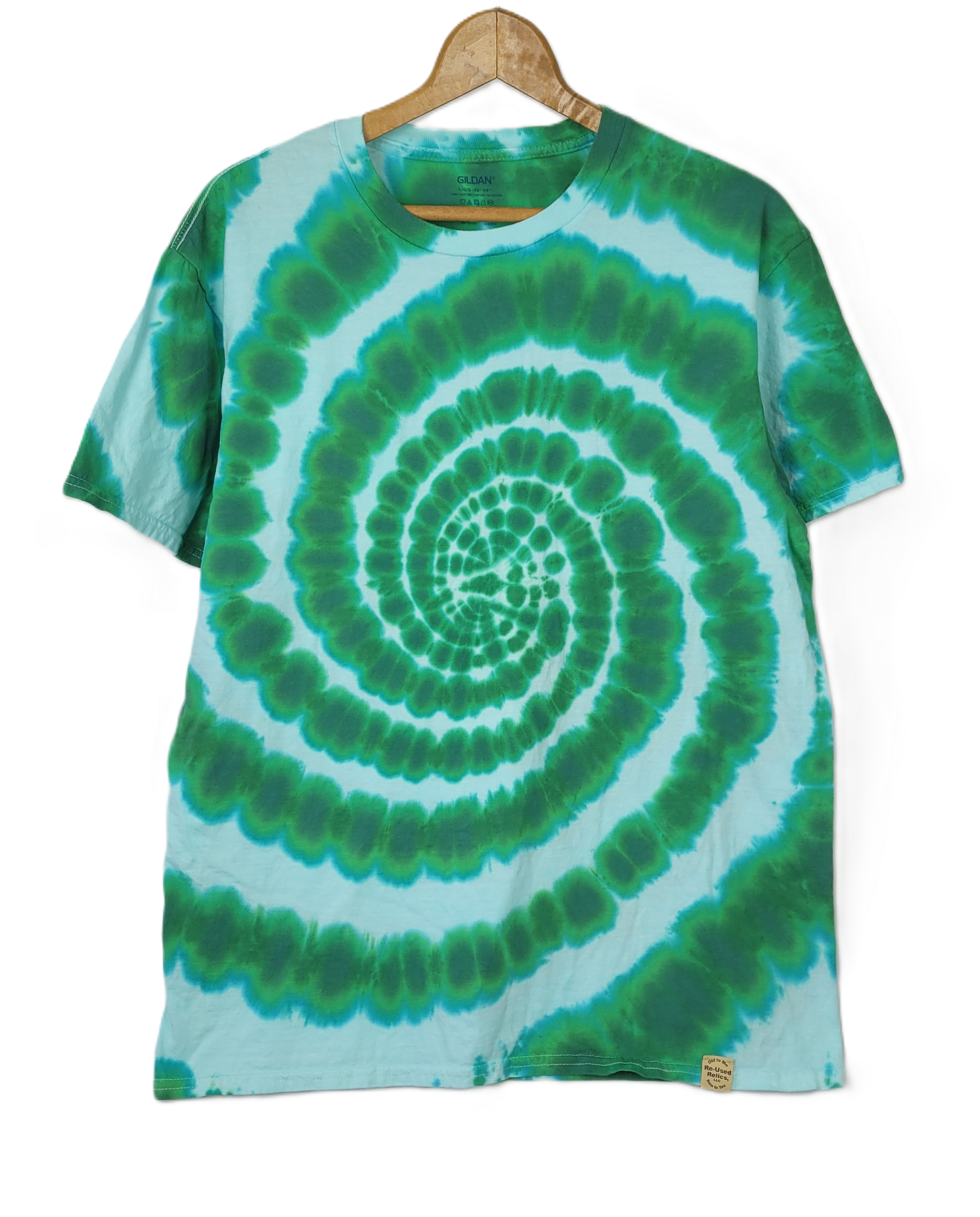 Tie-dye t-shirt with green and blue spiral pattern on a hanger