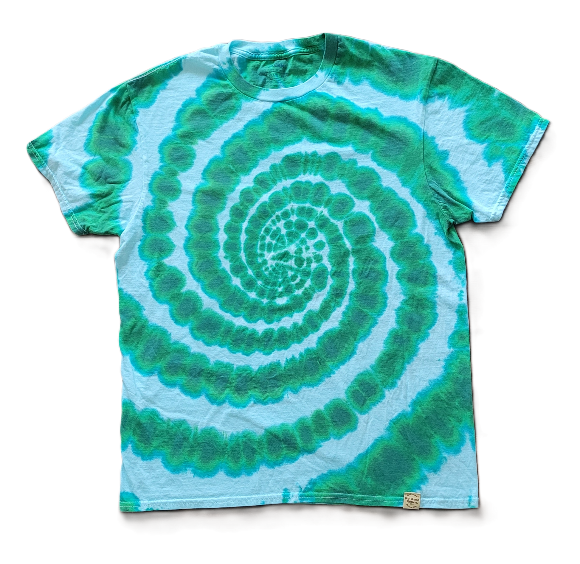Tie-dye t-shirt with green and blue spiral pattern on a white background