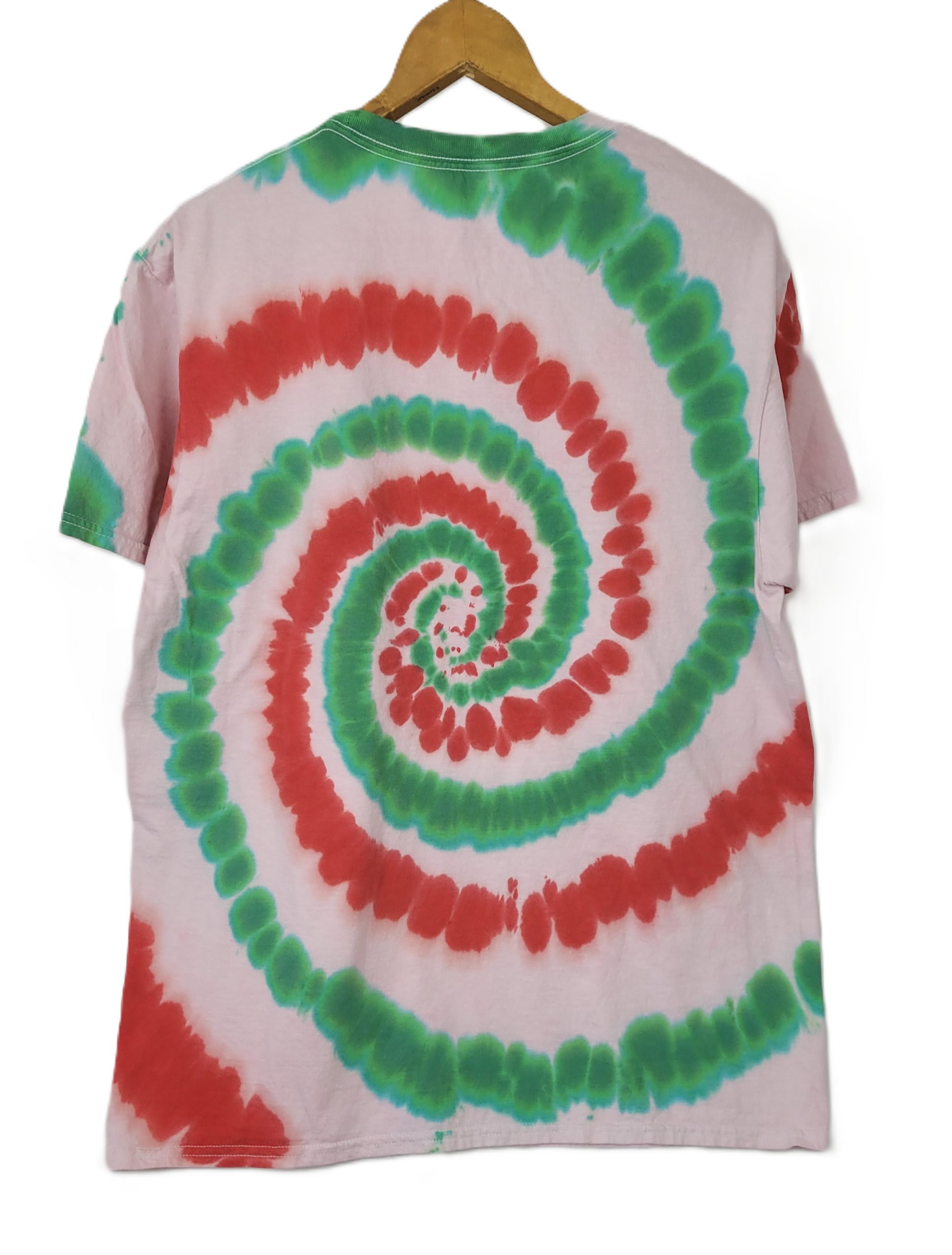 Tie-dye t-shirt with green and red spiral pattern on a white background