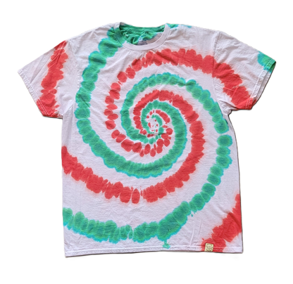 Tie-dye t-shirt with red and green spiral pattern on a white background