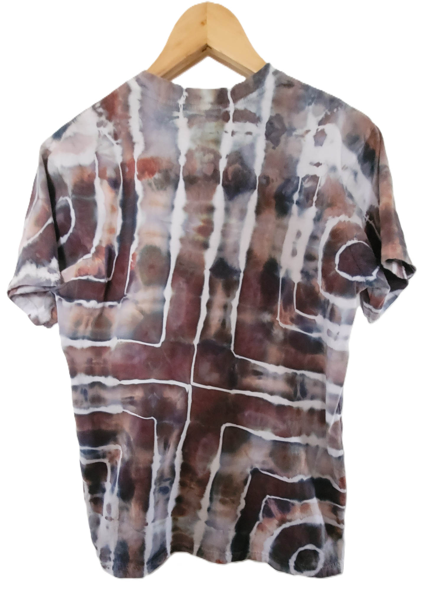 Tie-dye shirt on a wooden hanger with a white background