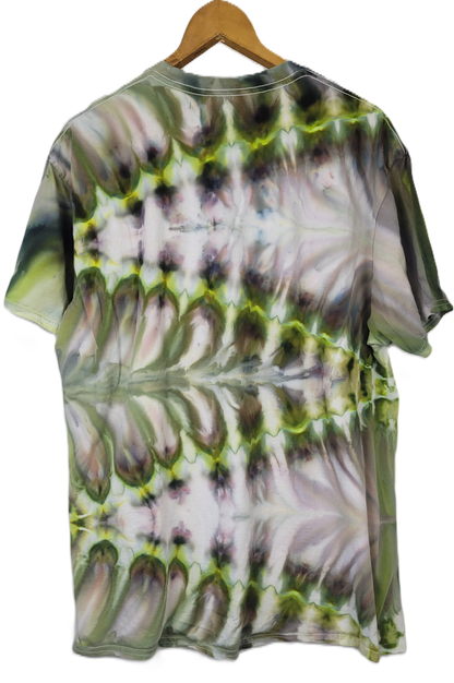 Tie-dye t-shirt on a wooden hanger with a white background