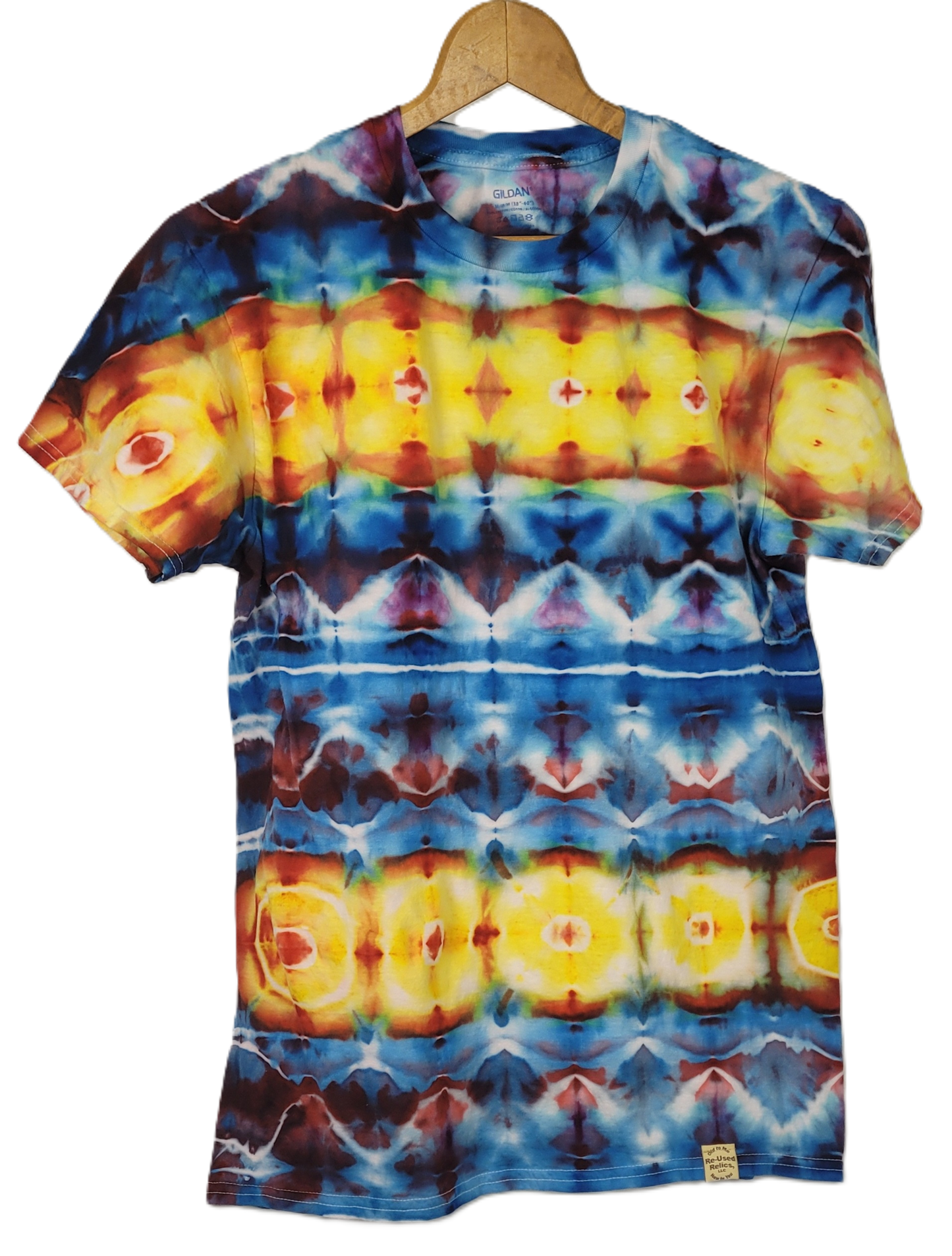 Tie-dye t-shirt with a colorful pattern on a hanger against a white background