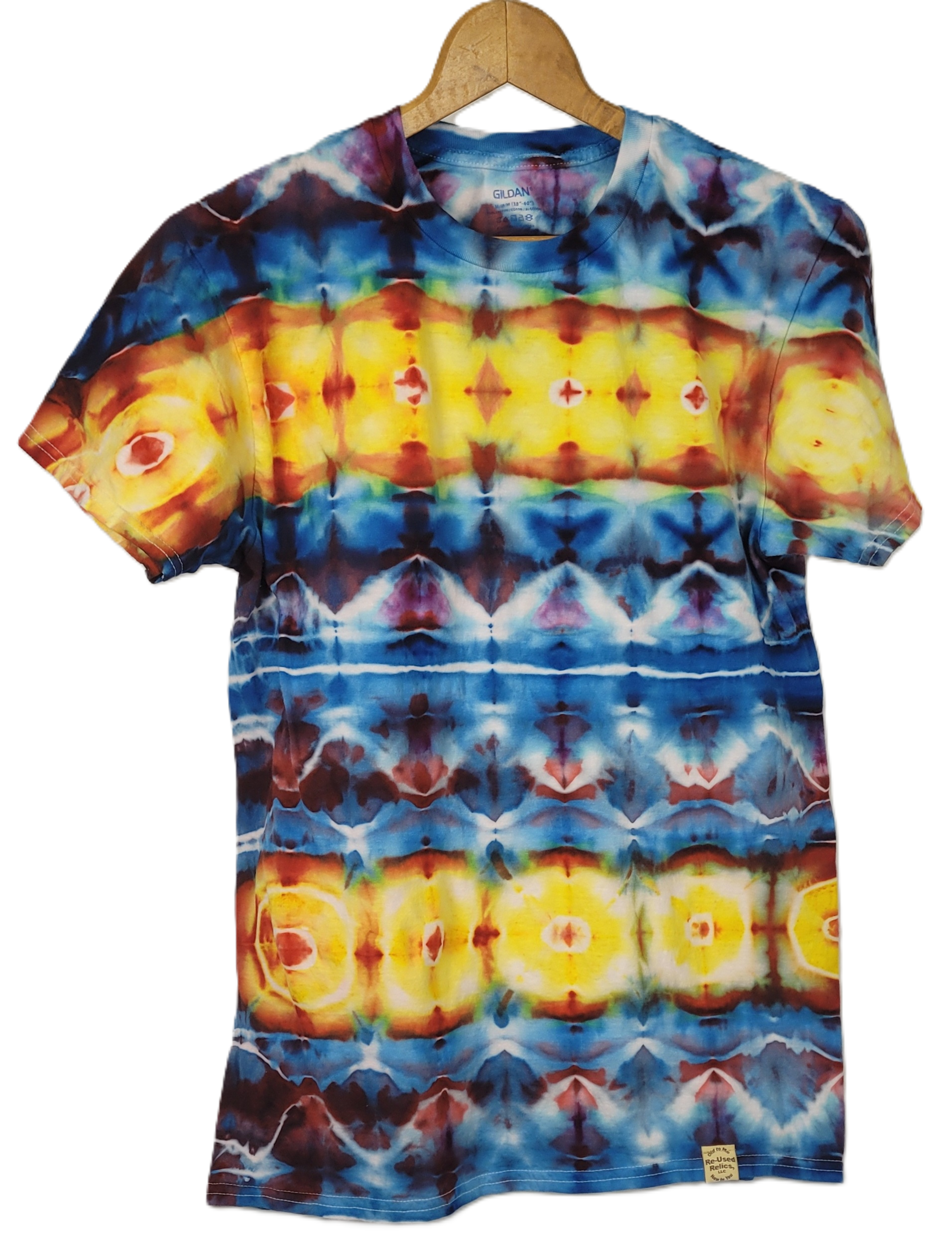 Tie-dye t-shirt with a colorful pattern on a hanger against a white background