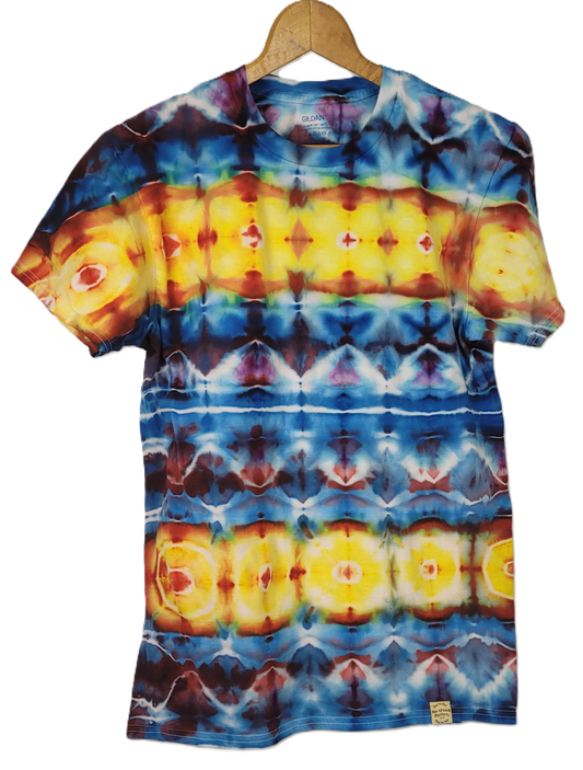 Tie-dye t-shirt with a colorful pattern on a hanger against a white background