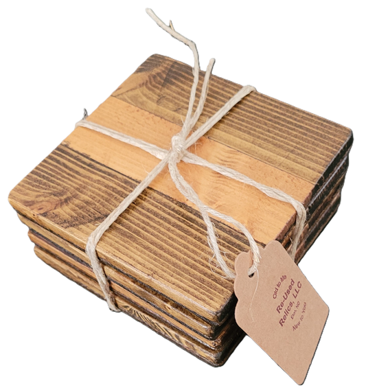 Stack of wooden coasters tied with string on a dark surface