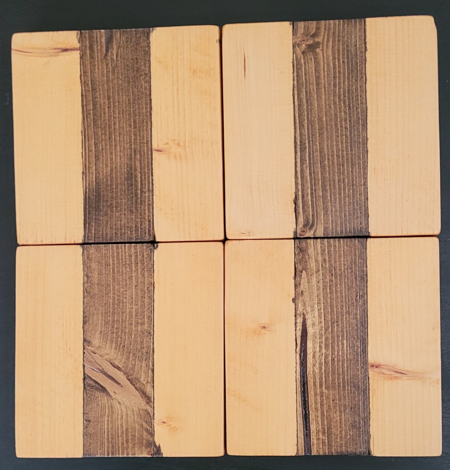 Four wooden coasters.
