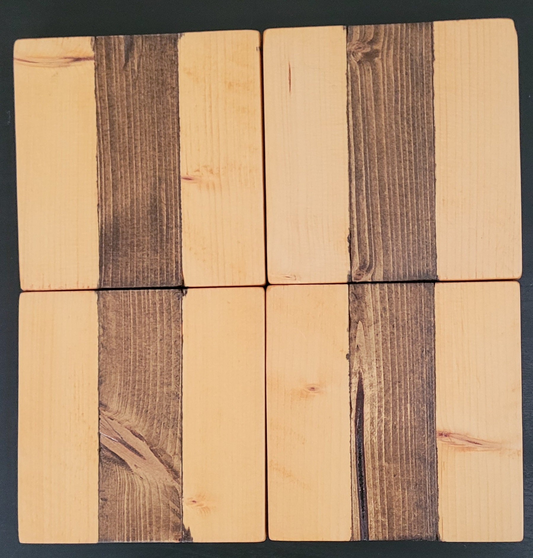 Four wooden coasters.