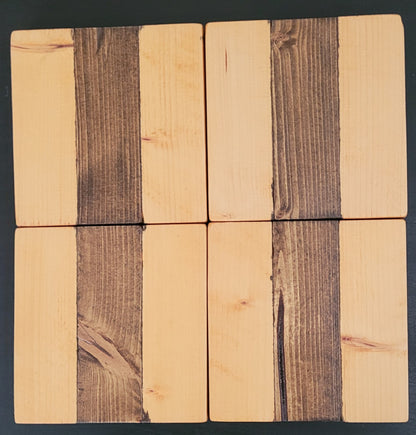 Four wooden coasters.