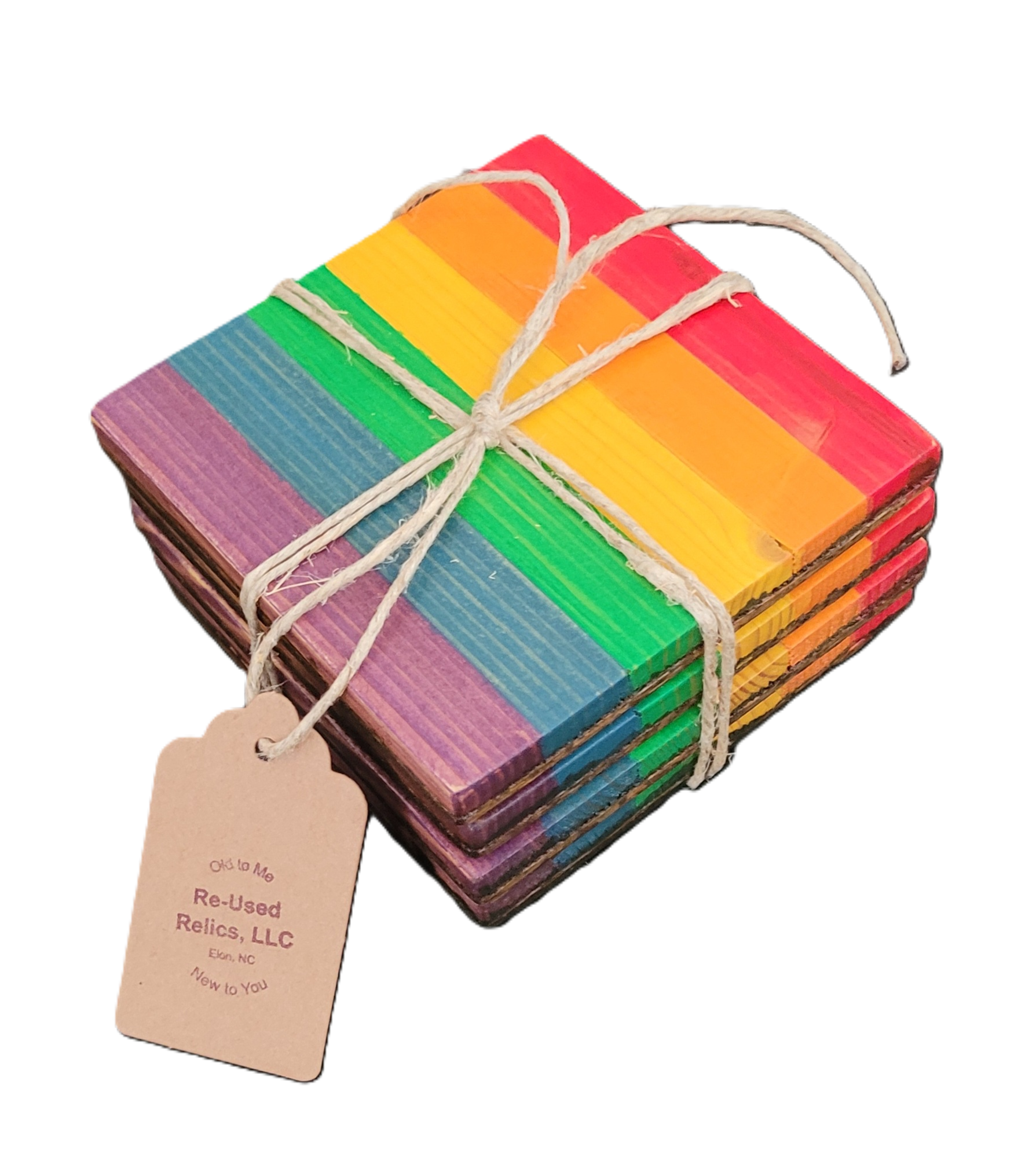 Stack of rainbow-colored coasters tied with twine on a black background, with a tag from Re-Used Relics, LLC.