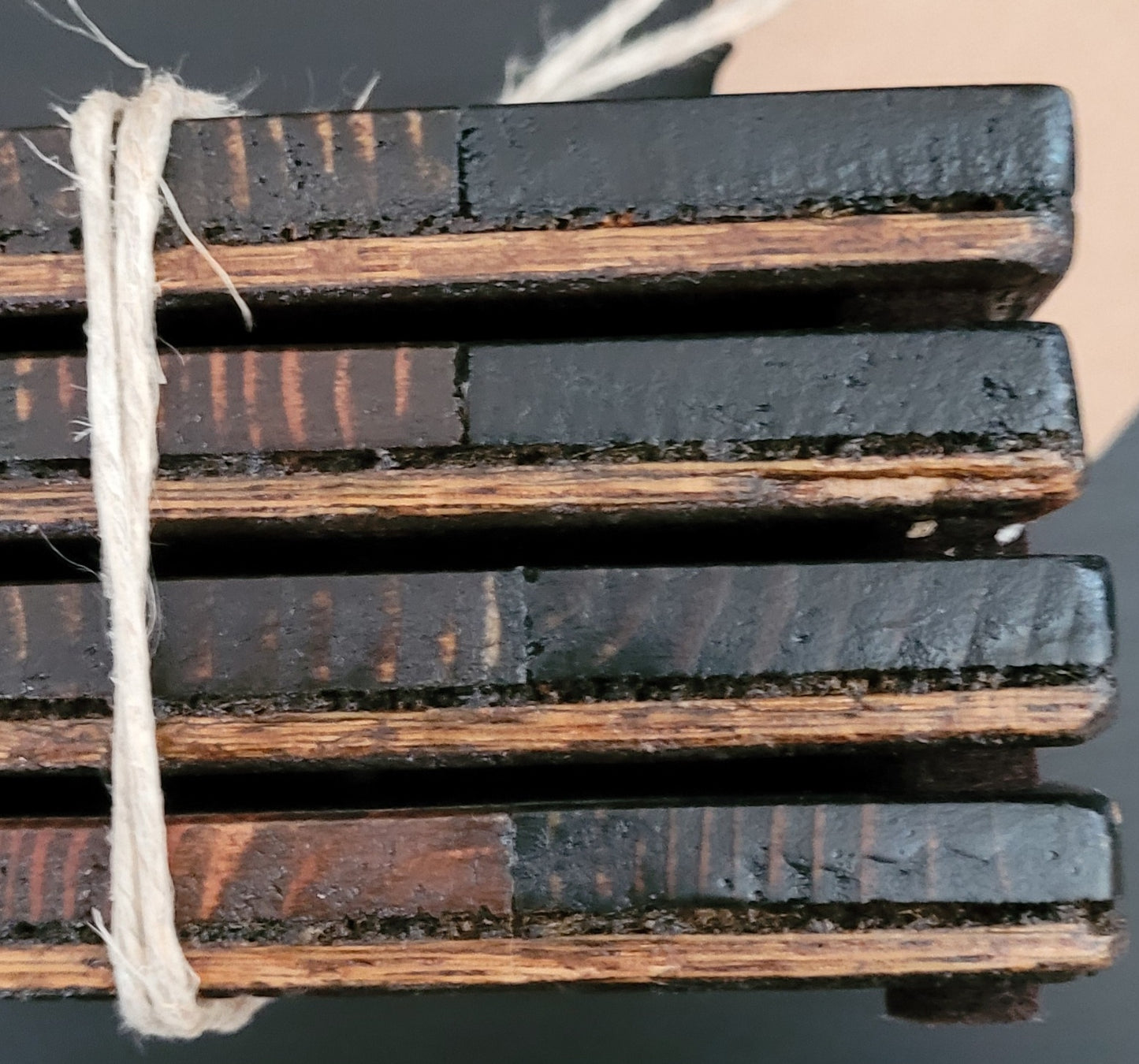 Close-up of wooden coasters edges.