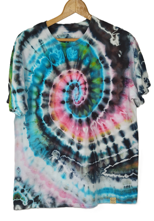 Tie-dye t-shirt with a spiral pattern on a hanger
