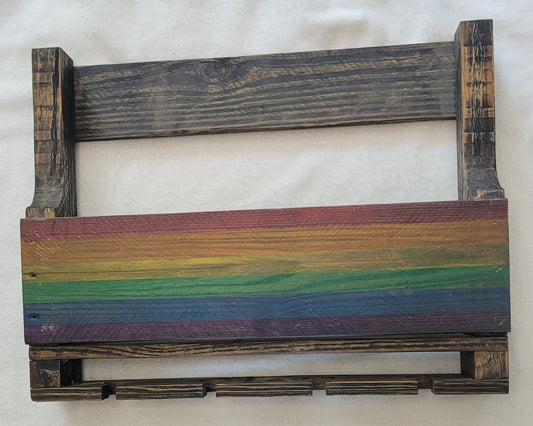 Wooden wine rack with rainbow design on a white background