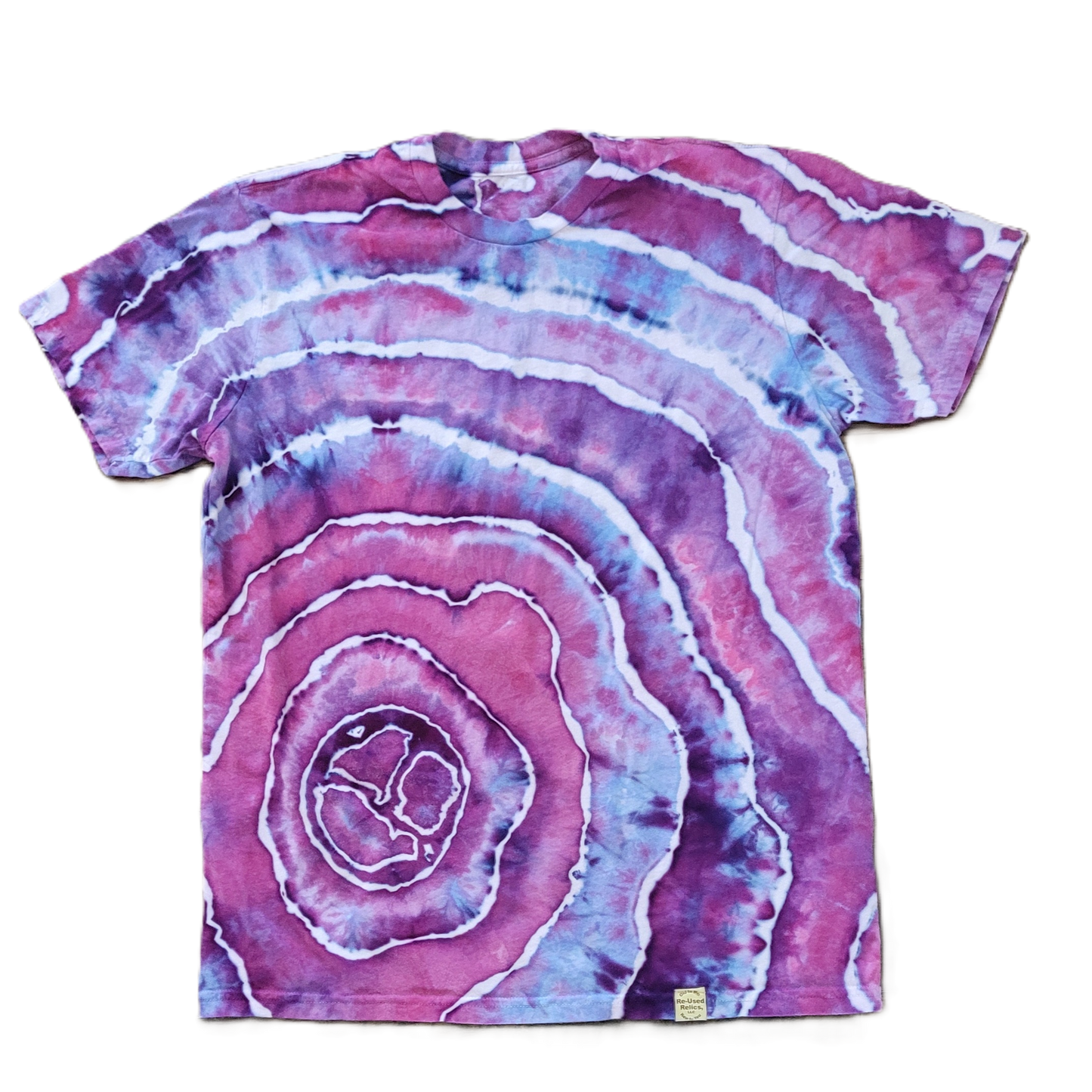 Tie-dye t-shirt with concentric circle pattern on a white background