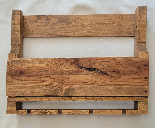 Wooden wine rack with a natural finish on a white background
