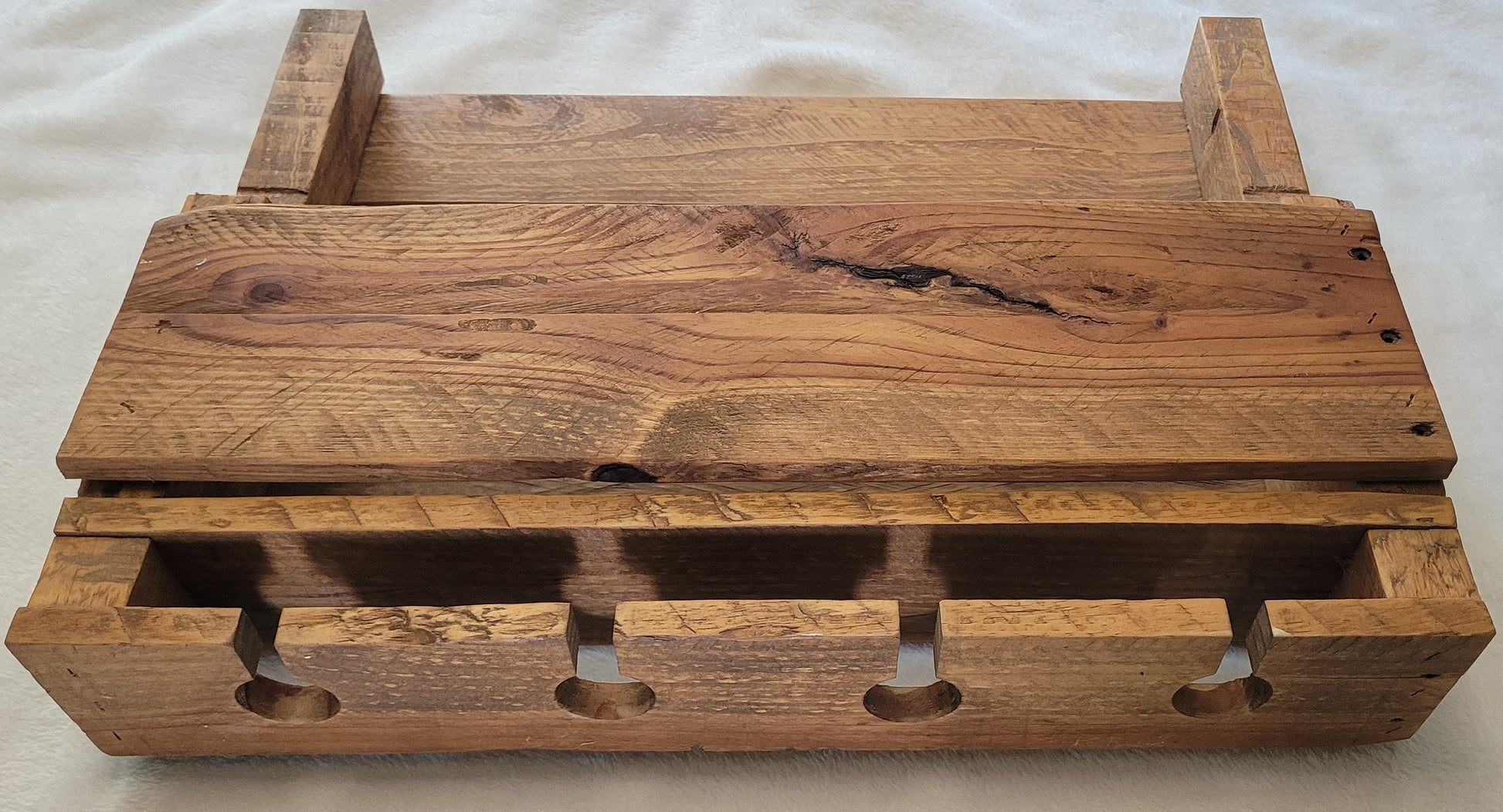 Wooden wine rack on a white background