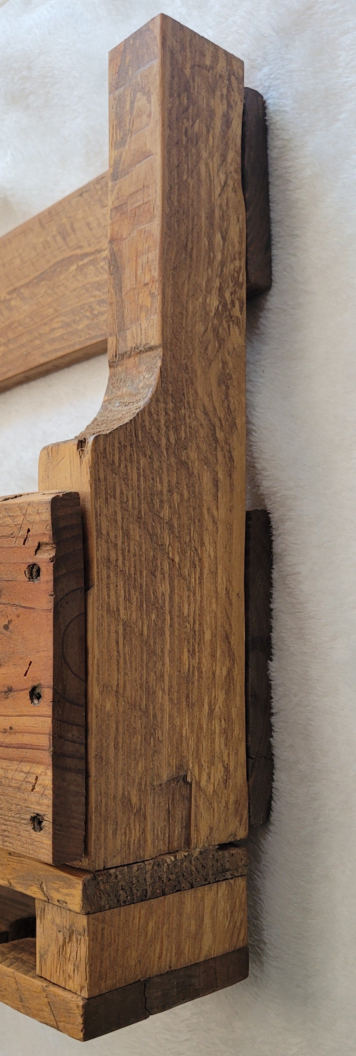 Wooden wine rack on a white background