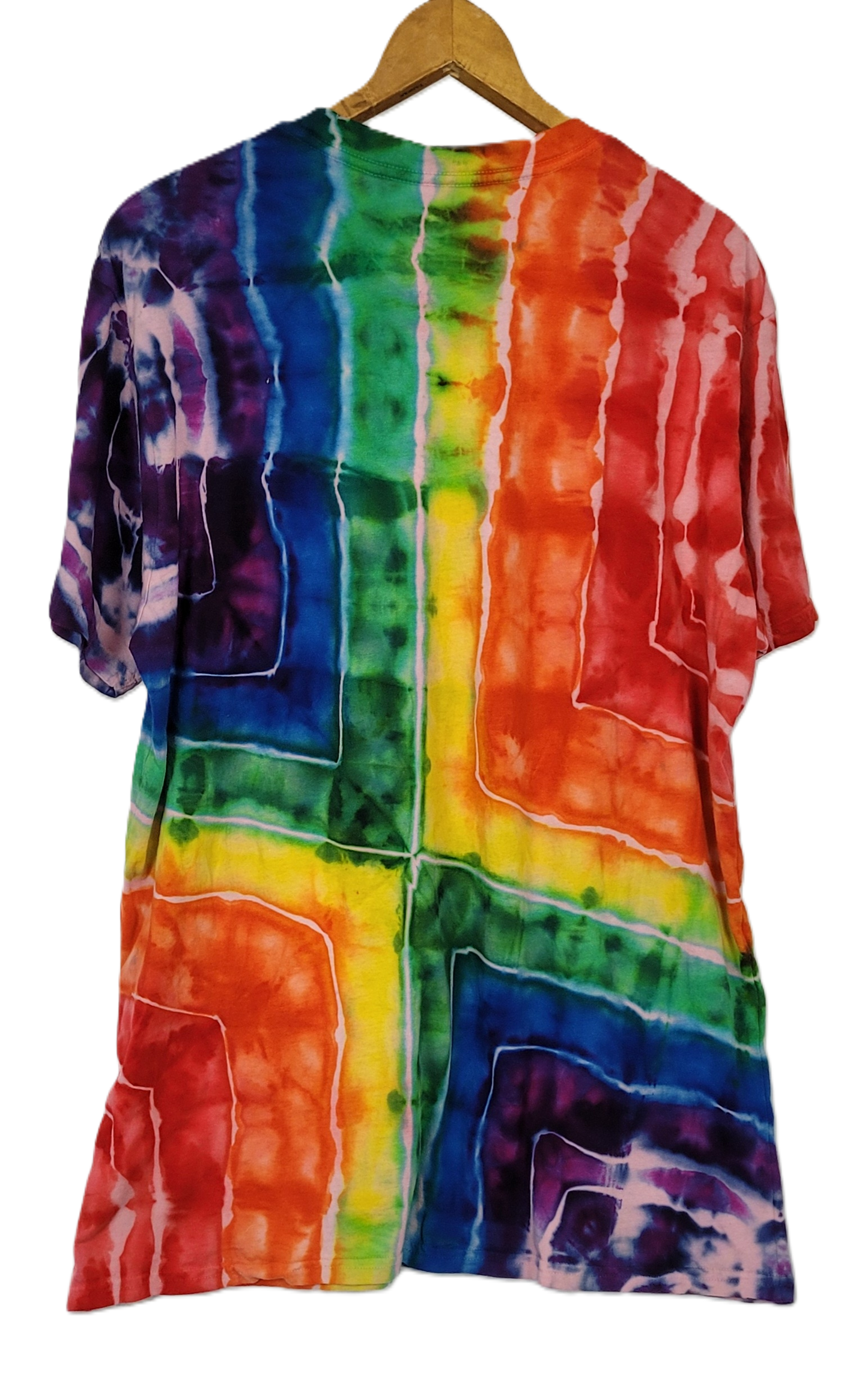 Multicolored tie-dye shirt on a hanger against a white background