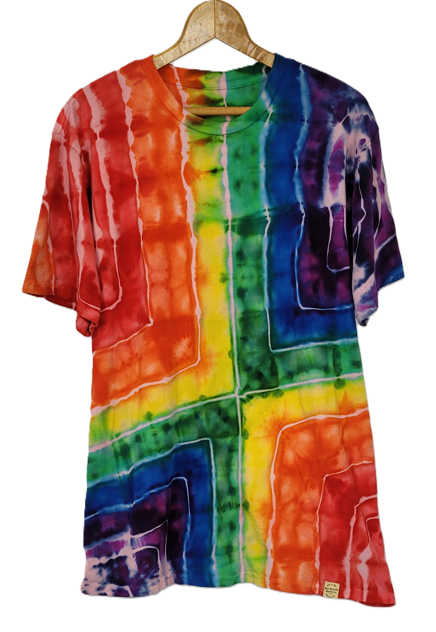 Multicolored tie-dye shirt on a hanger against a white background