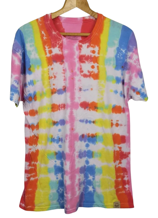 Colorful tie-dye t-shirt on a hanger with a white background