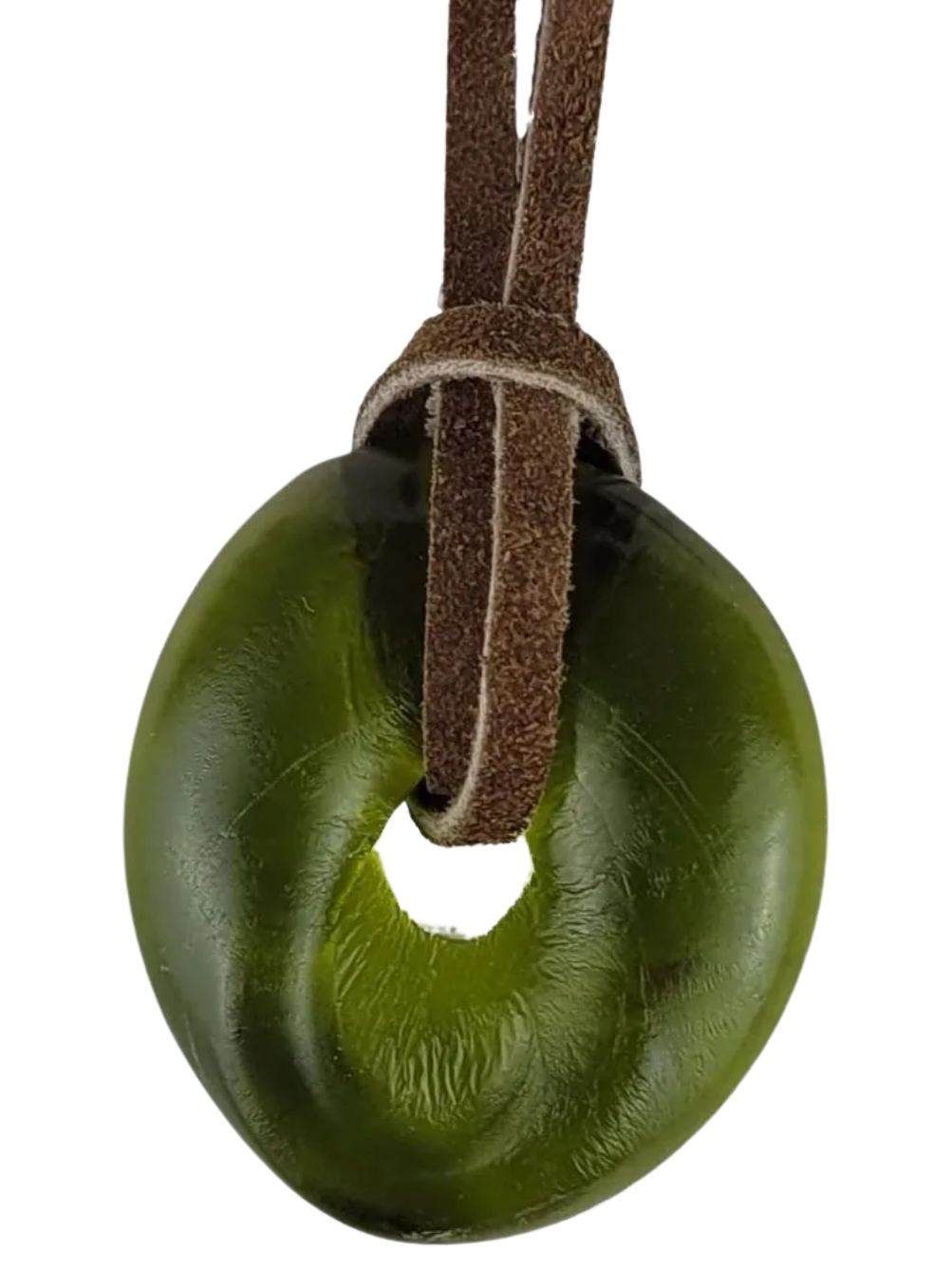 Green donut-shaped object on a brown leather strap against a white background