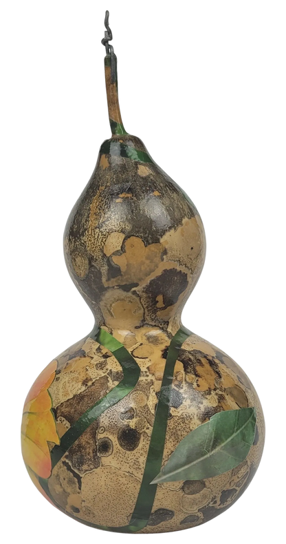 Decorative gourd with artistic design on a white background