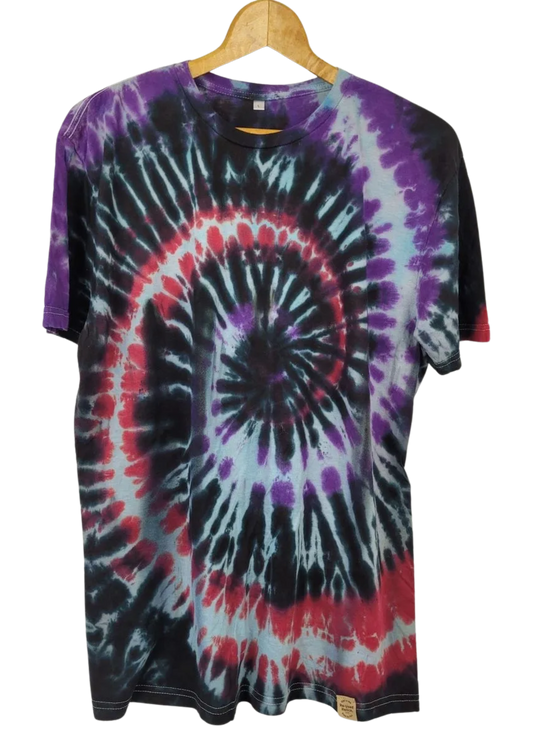Tie-dye t-shirt with a spiral pattern on a hanger