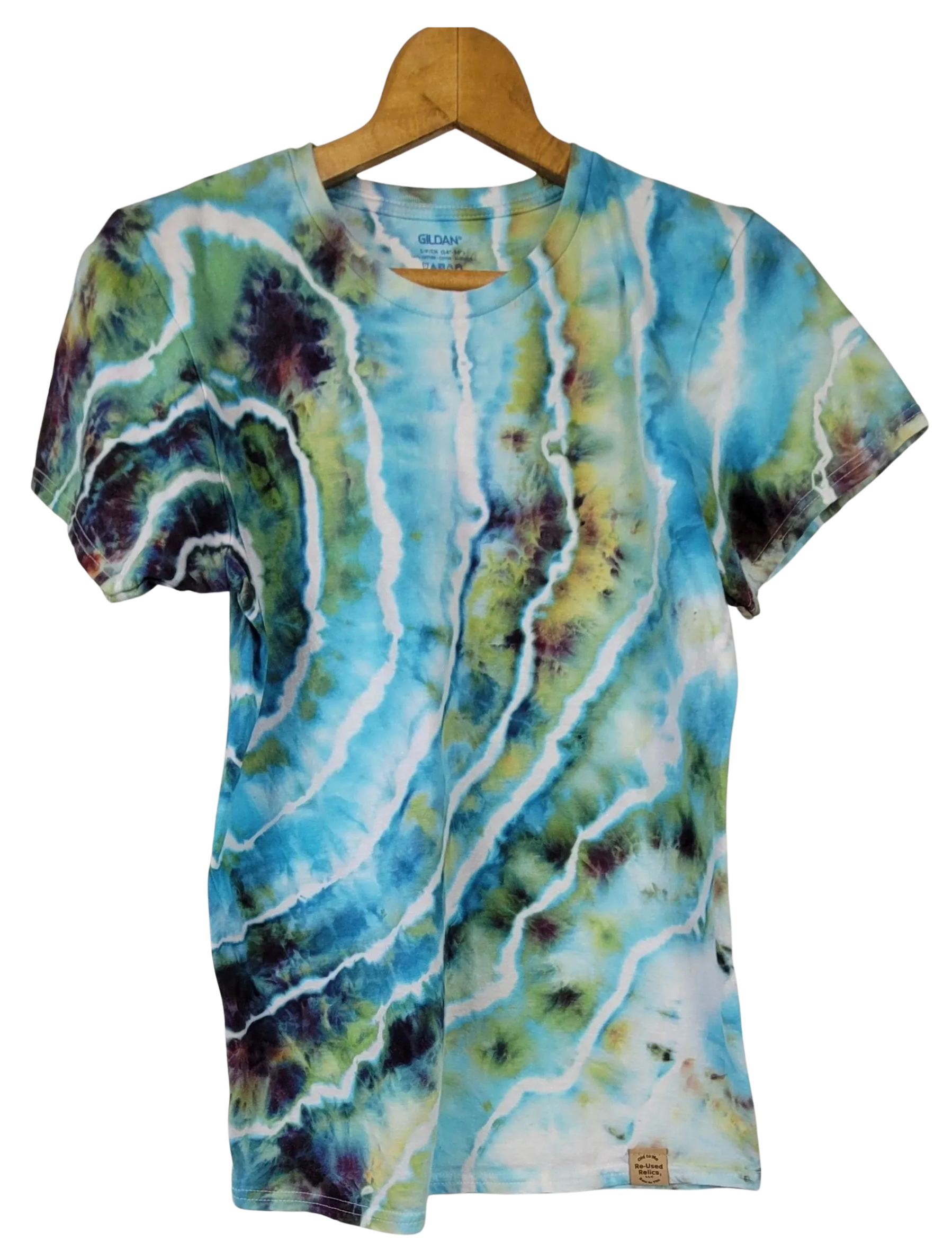 Tie-dye t-shirt with blue, green, and white patterns on a wooden hanger.